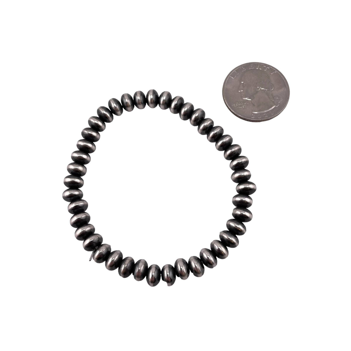 Sterling Silver Navajo Pearl Oxidize Saucer Bead Stretch Bracelet. Available from 3mm to 9mm: 5.5mm