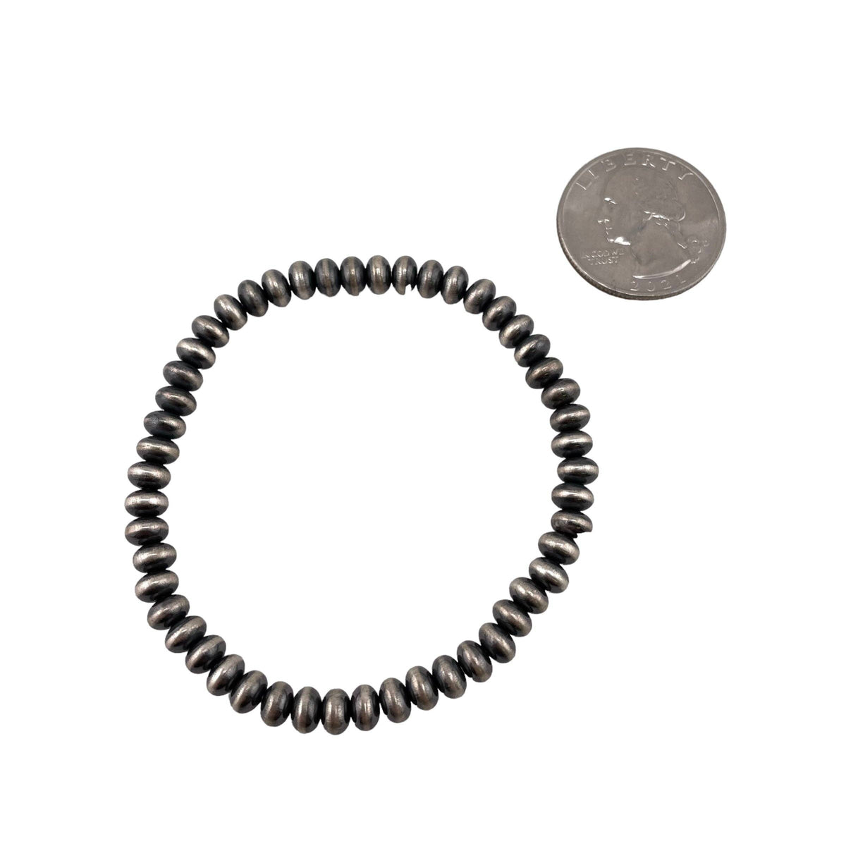 Sterling Silver Navajo Pearl Oxidize Saucer Bead Stretch Bracelet. Available from 3mm to 9mm: 5.5mm