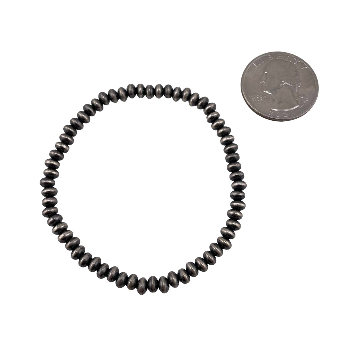 Sterling Silver Navajo Pearl Oxidize Saucer Bead Stretch Bracelet. Available from 3mm to 9mm: 5.5mm